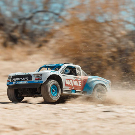 Arrma 1/16 MOJAVE GROM 223S DSC 4X4 RTR Brushless Desert Truck (Teal/Pink or White/Blue) (Battery & Charger Included)